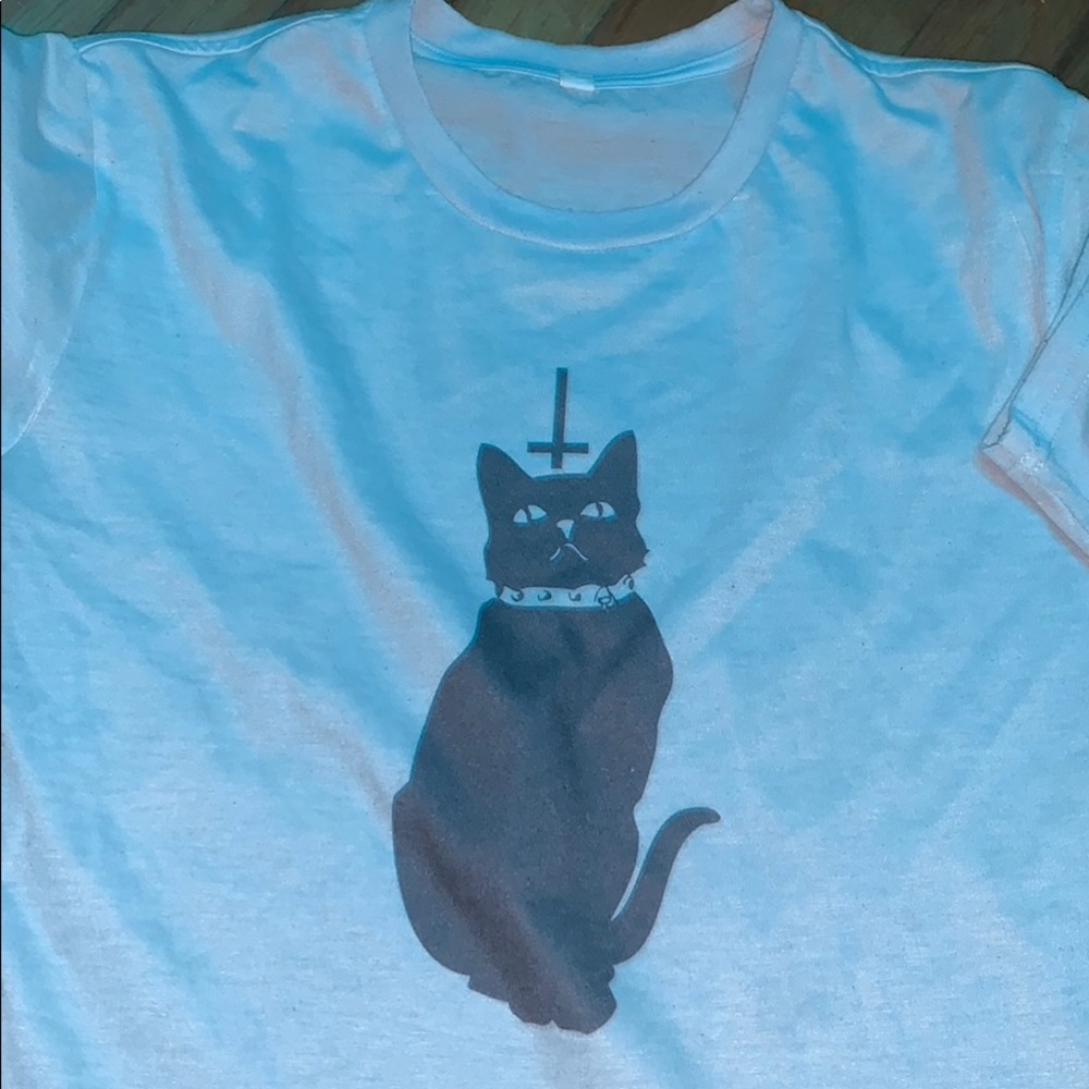 White T upside down cross cat